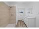 Updated bathroom with new vanity, quartz countertop, and shower at 5525 Tillman Rd, Lakeland, FL 33810