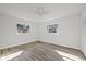 Bright bedroom with new flooring and ample closet space at 5525 Tillman Rd, Lakeland, FL 33810