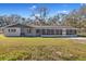 Ranch style home with screened porch and large yard at 5525 Tillman Rd, Lakeland, FL 33810