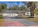 Ranch-style home with attached garage and spacious yard at 5525 Tillman Rd, Lakeland, FL 33810