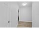 Bright hallway with new flooring and fresh paint at 5525 Tillman Rd, Lakeland, FL 33810