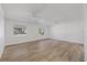 Bright and airy living room with large windows and ceiling fans at 5525 Tillman Rd, Lakeland, FL 33810