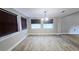 Dining room with wood-look tile floor and neutral walls at 1650 Pine Ave, Mount Dora, FL 32757