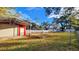 Large backyard with a detached shed and privacy fence at 3720 Willis Rd, Mulberry, FL 33860