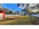 Large backyard with a storage shed and privacy fence at 3720 Willis Rd, Mulberry, FL 33860