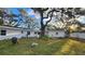 Large backyard with a detached shed and plenty of space for outdoor activities at 3720 Willis Rd, Mulberry, FL 33860