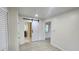 Bright hallway with barn door leading to bathroom at 3720 Willis Rd, Mulberry, FL 33860