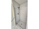 Modern shower with penny round tile floor and subway tile walls at 3720 Willis Rd, Mulberry, FL 33860