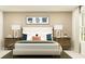 Spacious bedroom with a king-size bed and wooden nightstands at 922 Hour Glass Rd, Lakeland, FL 33801