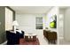 Bright and airy common area features stylish seating and a modern media center at 922 Hour Glass Rd, Lakeland, FL 33801
