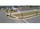 Corner lot featuring a well-manicured lawn and a two-car garage at 930 Fieldstone Way, Haines City, FL 33844