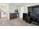 Spacious basement features a sink and cabinets on the left and a work station on the right at 930 Fieldstone Way, Haines City, FL 33844
