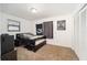 Cozy bedroom with a queen-sized bed, neutral carpet, and a window for natural light at 18 Pine Circle Dr, Ocala, FL 34472