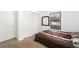 Simple bedroom featuring carpet flooring, a closet, and a window for natural light at 18 Pine Circle Dr, Ocala, FL 34472