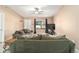 Comfortable living room featuring neutral walls, tile flooring, and large sofas for relaxation at 18 Pine Circle Dr, Ocala, FL 34472