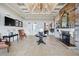 Elegant community room with fireplace and seating at 4827 Waltham Forest Dr, Davenport, FL 33837