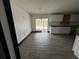 Dining area with gray tile floors and access to the backyard at 4534 Lemans Dr, Orlando, FL 32808