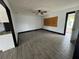 Living room with gray tile floors and a ceiling fan at 4534 Lemans Dr, Orlando, FL 32808