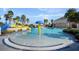 Fun pool with a mushroom water feature and slide at 5327 Dagenham Dr, Davenport, FL 33837