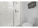 Bright bathroom with a modern glass-enclosed shower and sleek fixtures at 760 Pebble Beach Dr, Davenport, FL 33896