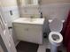 Bathroom with toilet and vanity at 1106 Avenue N, Haines City, FL 33844
