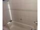 Bathroom with shower and bathtub at 1106 Avenue N, Haines City, FL 33844