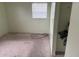 Simple bedroom with closet and window at 1106 Avenue N, Haines City, FL 33844