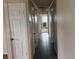 Hallway with tile flooring and neutral walls at 1106 Avenue N, Haines City, FL 33844