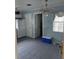 Kitchen with light blue walls and tiled floor at 1106 Avenue N, Haines City, FL 33844