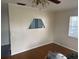 Bright living room with wood flooring and built-in shelving at 1106 Avenue N, Haines City, FL 33844