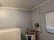 Unfinished mechanical room with water heater at 1106 Avenue N, Haines City, FL 33844