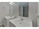 Bathroom with double vanity and shower at 854 4Th St, Winter Haven, FL 33881