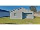 Newly built home with light blue exterior and small yard at 854 4Th St, Winter Haven, FL 33881