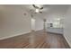 Open living room features hardwood floors and an open concept kitchen at 854 4Th St, Winter Haven, FL 33881