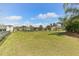 A large, green backyard, fenced in for privacy and security at 4079 Grandefield Cir, Mulberry, FL 33860