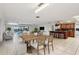 Spacious living and dining areas featuring tiled floors, modern furnishings, and abundant natural light at 8309 W Lake Marion Rd, Haines City, FL 33844