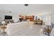 Open concept with a casual living area, a dining table, and a kitchen in a large room at 8309 W Lake Marion Rd, Haines City, FL 33844
