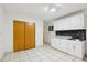Bright room with tile floor, closet, white cabinets, and sink at 8309 W Lake Marion Rd, Haines City, FL 33844