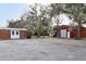 Exterior view of storage buildings on a large lot with room for boats or other vehicles at 8309 W Lake Marion Rd, Haines City, FL 33844