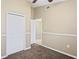 Bedroom with double door closet and neutral decor at 5119 Martinique Dr, Lakeland, FL 33812