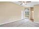 Bedroom with patio access and neutral decor at 5119 Martinique Dr, Lakeland, FL 33812