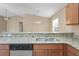 Kitchen with granite countertops and breakfast bar at 5119 Martinique Dr, Lakeland, FL 33812