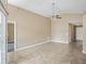 Open living space with tile flooring and lots of natural light at 5119 Martinique Dr, Lakeland, FL 33812