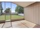 Spacious screened lanai overlooking a large backyard at 5119 Martinique Dr, Lakeland, FL 33812