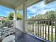 Relaxing balcony overlooking the tree-lined street at 622 Penn Pl, Winter Park, FL 32789