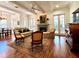 Spacious living room with hardwood floors, fireplace, and French doors at 622 Penn Pl, Winter Park, FL 32789