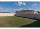 Large, well-maintained backyard with a tall privacy fence at 637 Bernard Ln, Davenport, FL 33837