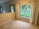 Spacious bedroom with carpet, and natural lighting coming from the windows at 417 Lake Butler Dr, Kissimmee, FL 34759