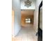 Inviting entryway with tiled floor and views of the living space beyond at 417 Lake Butler Dr, Kissimmee, FL 34759
