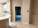 The kitchen has white cabinets and modern appliances at 417 Lake Butler Dr, Kissimmee, FL 34759